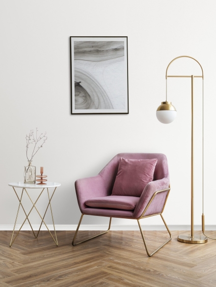 picture-frame-with-abstract-art-by-pink-velvet-armchair-min
